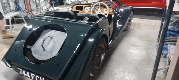 Restored Morgan rear three-quarter view after deep dark green respray