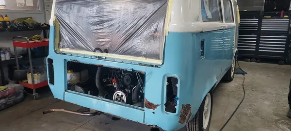 VW camper rear engine bay area showing bodywork repair work in progress