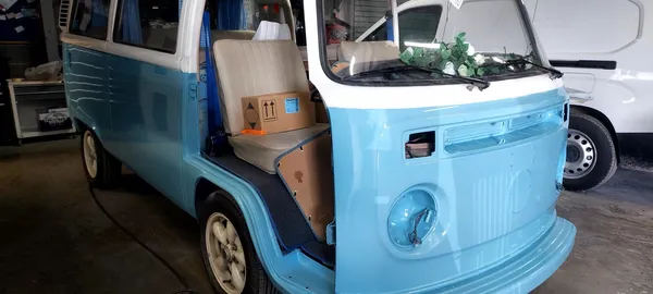 VW camper with freshly painted blue and white panels in CPRS Grimsby workshop