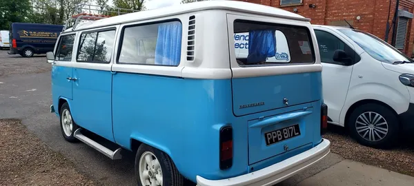 Restored VW Type 2 Bay Window camper rear three-quarter view outside CPRS Grimsby workshop