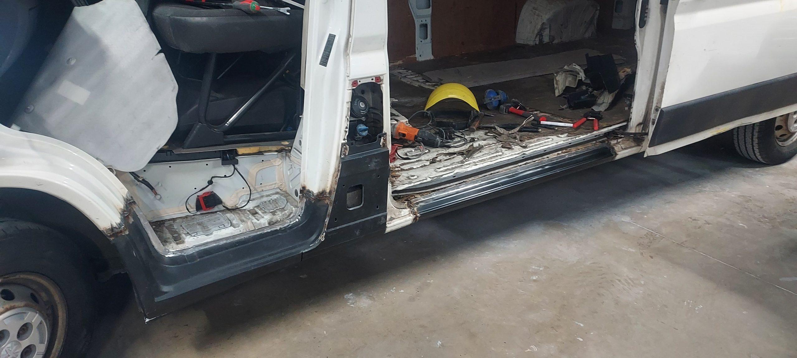CPRS team working on a vehicle repair in the Grimsby workshop